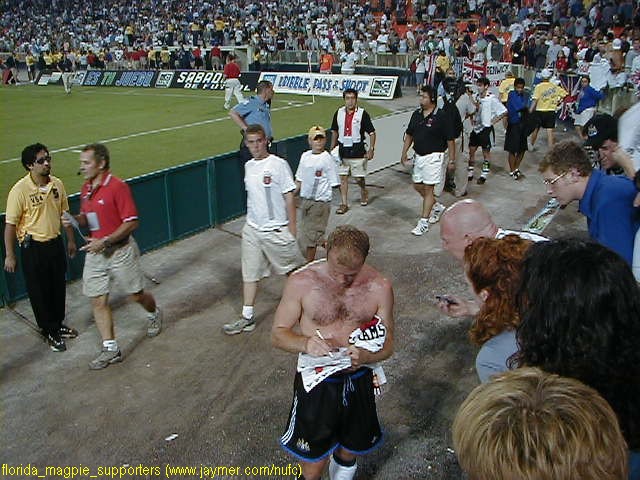 for autographs following the match.
