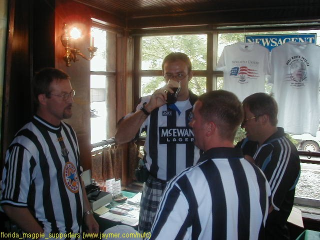 The US branch's leader, Mark Harper, knocks down a manly Guiness in his manly B&W Tartan